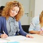 image of a woman taking an assessment